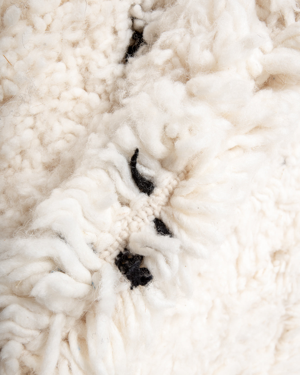 Modern, designer, handcrafted Berber rug from Morocco. Beniourain carpet with minimalist design, natural wool pile and a fluffy texture.